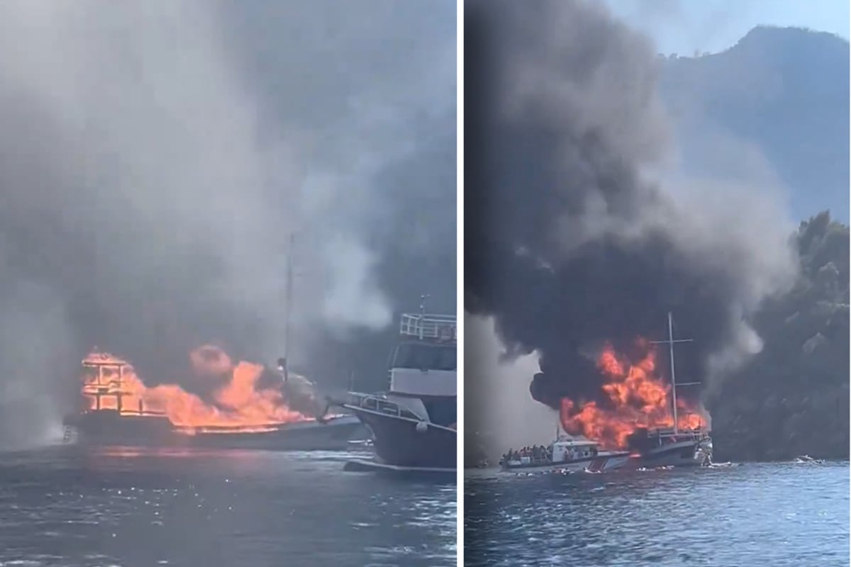 Ausflugsboot geht in Flammen auf - Verzweifelte Touristen springen über Bord
