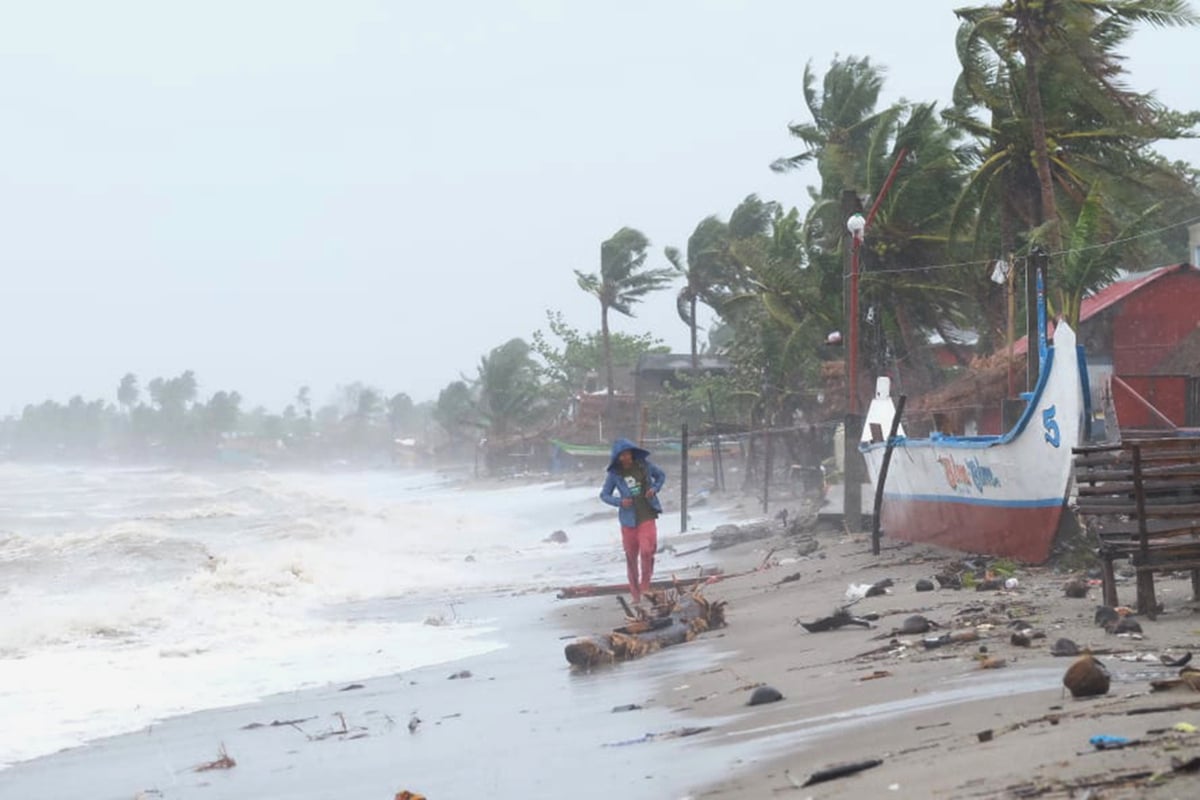 At least 16 dead and hundreds of thousands displaced as Typhoon Goni