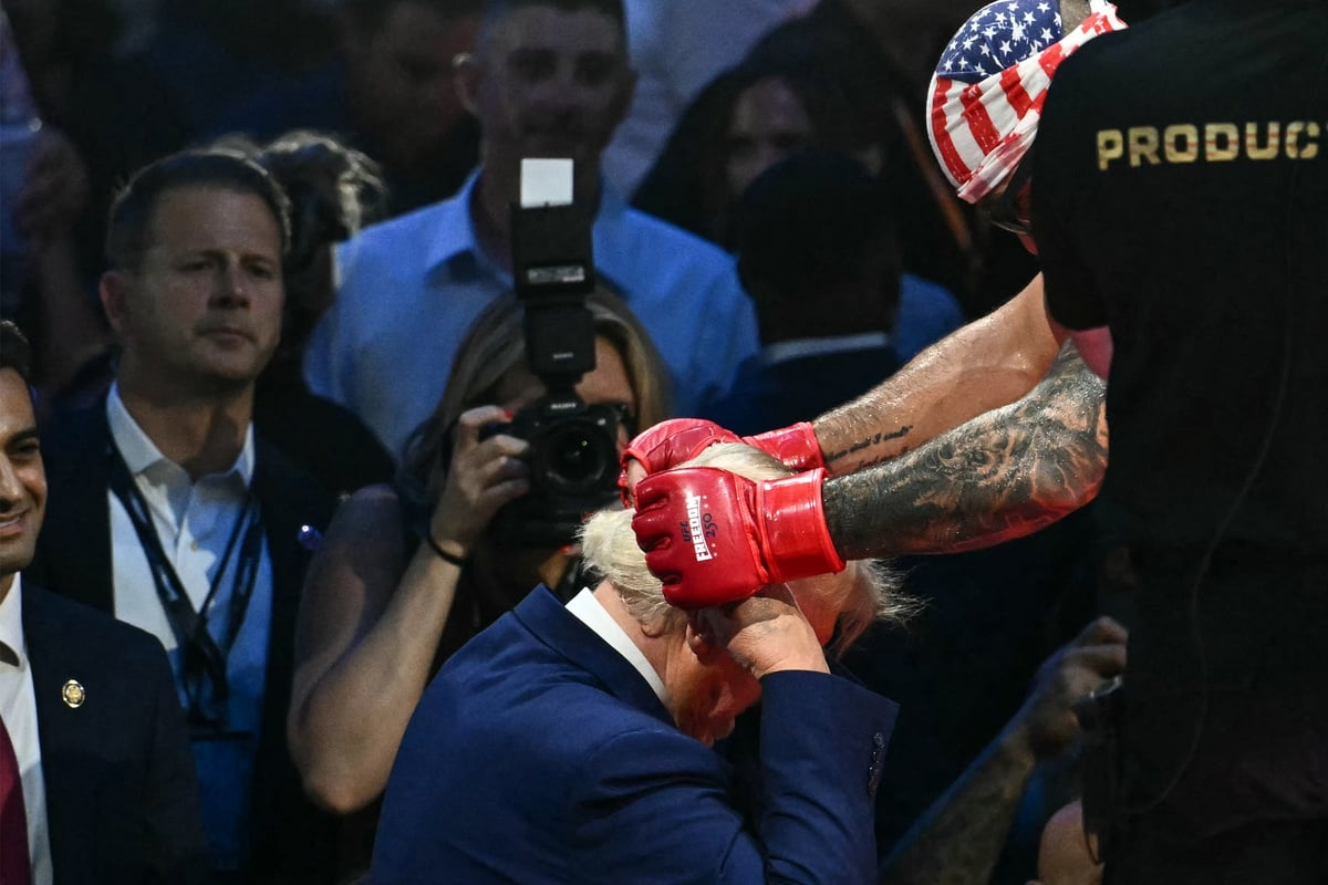 Trump appears to sneer after UFC fighter calls Michelle Obama a "man" during White House birthday bash