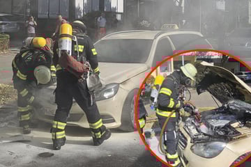 München: Taxi in Flammen: Ersthelfer versucht vergeblich zu löschen