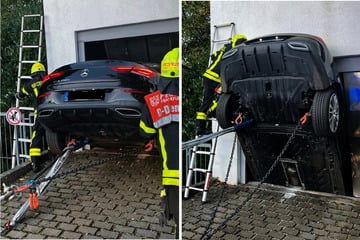 Wie konnte das denn passieren?! Mercedes kracht durch Tür von Auto-Aufzug