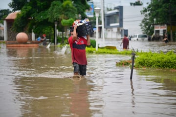 Mexico's torrential rains sweep away homes and people in minutes