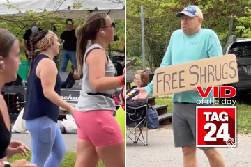 viral videos: Viral Video of the Day for May 4, 2024: Man hilariously offers "Free Shrugs" at marathon