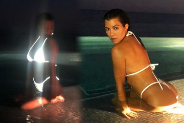 Kourtney Kardashian is mega erotic in Malibu, but what's going on with her bikini?