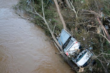 Flooded roads and power outages hamper rescue efforts after Hurricane Helene