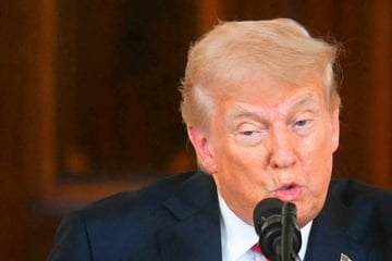 Trump defends possibly sending US into recession with his economic agenda