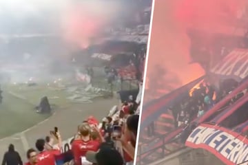 Spielabbruch! Fans legen Feuer auf der Tribüne und bewerfen Polizisten mit Eisenstangen