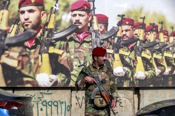 Iraqi paramilitary group warns US of "immense losses" as it prepares for long war in Iran