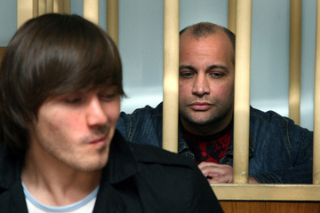 Russia pardons ex-cop convicted in infamous murder of journalist who criticized Putin