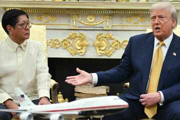 Trump reduces Philippines tariffs after visit from "tough negotiator" Marcos