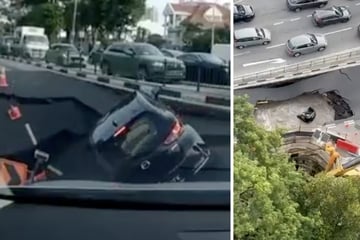 Schockmoment während Rushhour: Loch in Straße verschlingt komplettes Auto