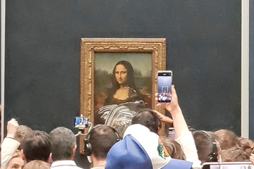 Mona Lisa painting gets caked by man disguised as old lady