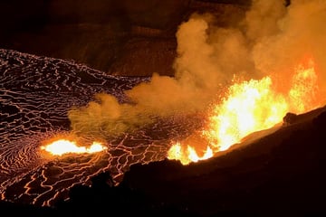 Hawaii's Kilauea volcano spews fresh lava as it nears year-long eruption