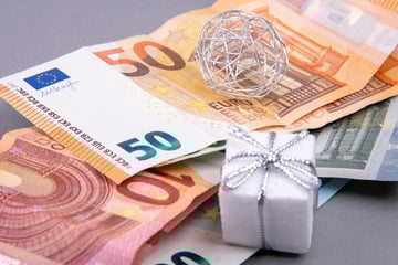 Geld als Weihnachtsgeschenk: Originelle Sprüche für Geldgeschenke