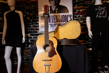 John Lennon guitar found in attic breaks Beatles world record at auction