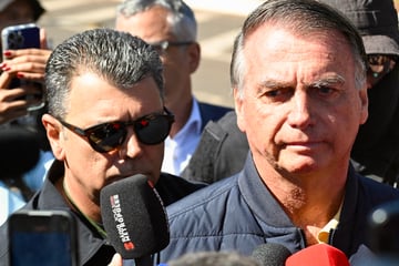 Brazil police raid home of Bolsonaro after Trump calls coup trial a "witch hunt"