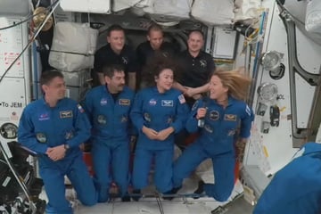 International crew finally blast off to space station after weather delay