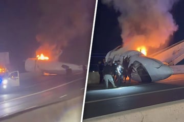 Flugzeug stürzt mitten auf Schnellstraße: Ein Mensch stirbt, Helfer riskieren ihr Leben