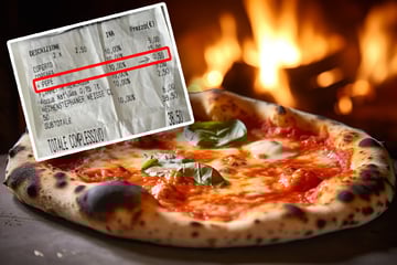 Mann freut sich auf Pizza: Als er auf die Rechnung schaut, wird er richtig sauer