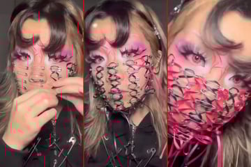 Body mod addict covers her face in safety pins with wild corset-inspired piercing