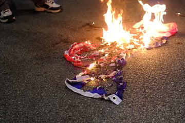 Trump backs off on executive order to charge people who burn American flags