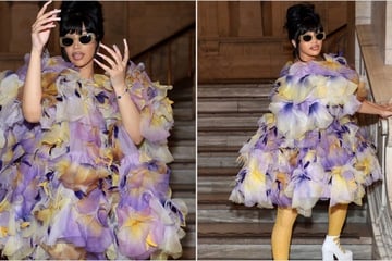 Cardi B stuns in colorful feathered look at Marc Jacob show
