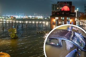 Hamburg: Trotz Absperrungen: Frau fährt in überflutete Unterführung, bleibt stecken und klettert aufs Dach