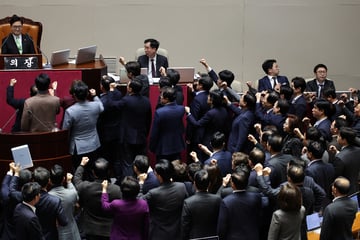 South Korea's parliament impeaches second president in as many weeks in chaotic scenes