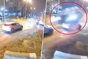 Wie im Actionfilm: Autofahrer fliegt über Kreisverkehr und Auto!