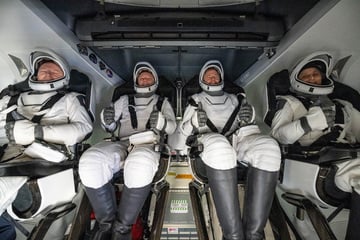 "Stranded" NASA astronauts splash down safely on Earth at last