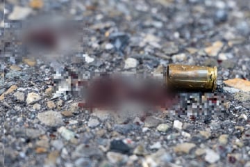 Zwei Menschen bei Streit an Tankstelle angeschossen, einer angefahren