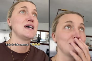 Paar bleibt der Mund offen stehen, als sie sehen, was nach ihrem Urlaub zu Hause auf sie wartet