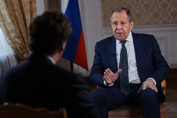 Russia's foreign minister threatens to send more "signals" to US in interview with Tucker Carlson