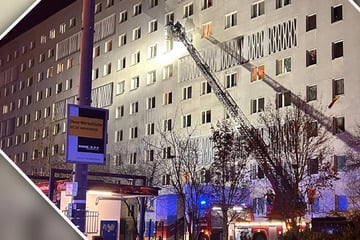 Anwohner müssen ihre Wohnungen verlassen: Möbel in Plattenbau-Flur stehen in Flammen