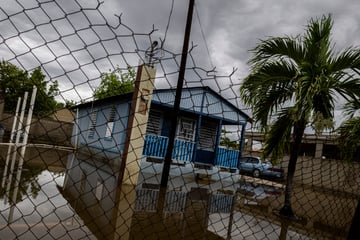 Hurricane Erin weakens – but dangerous flood threat remains
