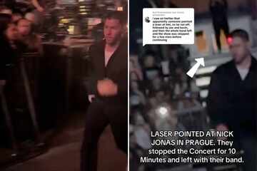 Nick Jonas flees the stage at Jonas Brothers concert after red laser is pointed at his head