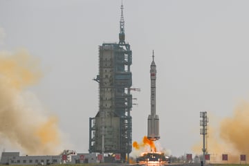 China launches unmanned spacecraft in mission to save astronauts stranded after debris incident