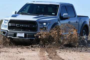 Trump says Japan will soon import "beautiful" Ford trucks as trade talks continue
