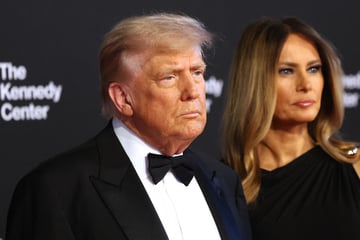 Trump brushes off performer boycott as he attends Les Mis at Kennedy Center