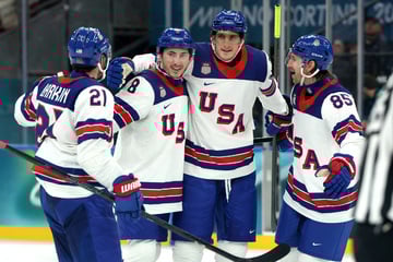 Winter Olympics: USA and Canada stay perfect in ice hockey after preliminary round wins