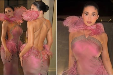 Kylie Jenner goes wild in pink feather gown for glitzy holiday bash