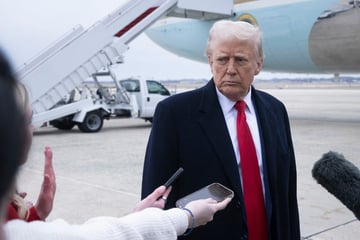 Reporter Smacks Trump in the face with a Boomic