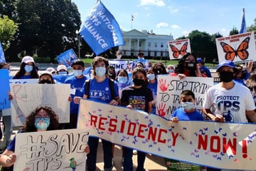 TPS holders call on White House to address "moral debt" in march for residency protections