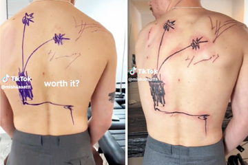 Man gets scribbled back tattoo and the abstract price speaks for itself