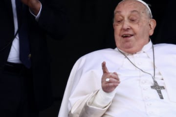 Pope Francis ends long hospital stay and makes first public appearance in weeks