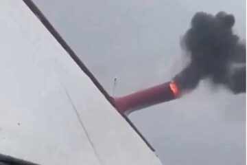 Cruise ship catches fire after suspected lightning strike
