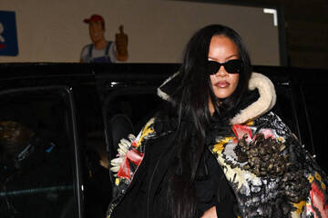 Rihanna accidentally flashes her naked bottom to paparazzi at A$AP Rocky's fashion show!