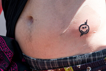 Tattoos stechen bei "Rock im Park": Ausgefallene Motive oder Band-Logos