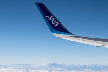 Flight from Tokyo diverted to Seattle after "unruly passenger" tries to open exit doors mid-air
