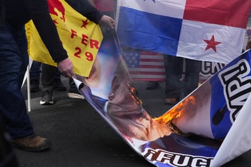 Trump branded "animal" and "public enemy" in angry protests over Panama Canal threat